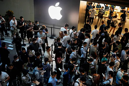 Apple раздаст по 90 долларов пользователям iPhone